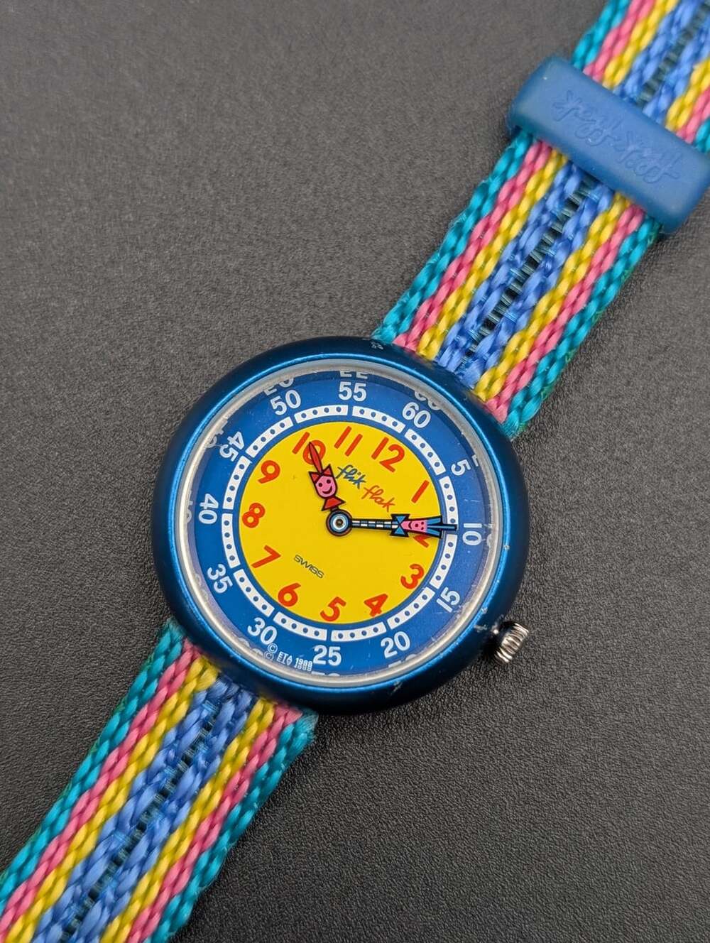 Flik Flak Swatch Blue Aluminum Watch, Colorful Woven Strap